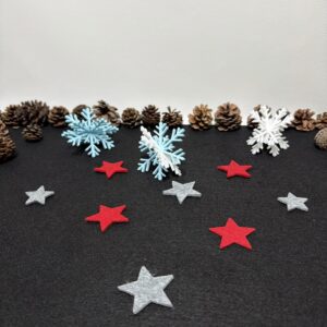 winterliche Schneeflocken in vers. Farben